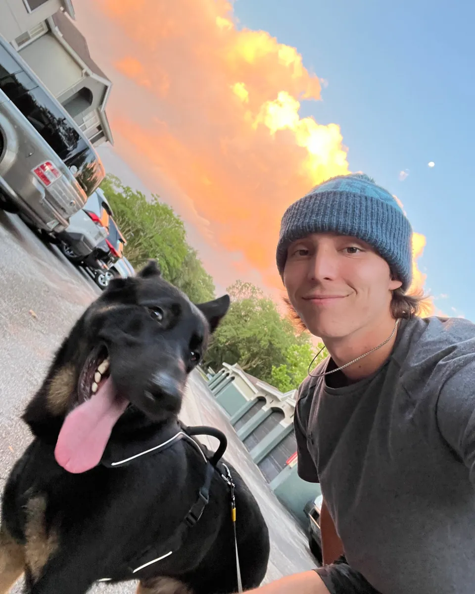 Cole and his dog Jax on an evening walk